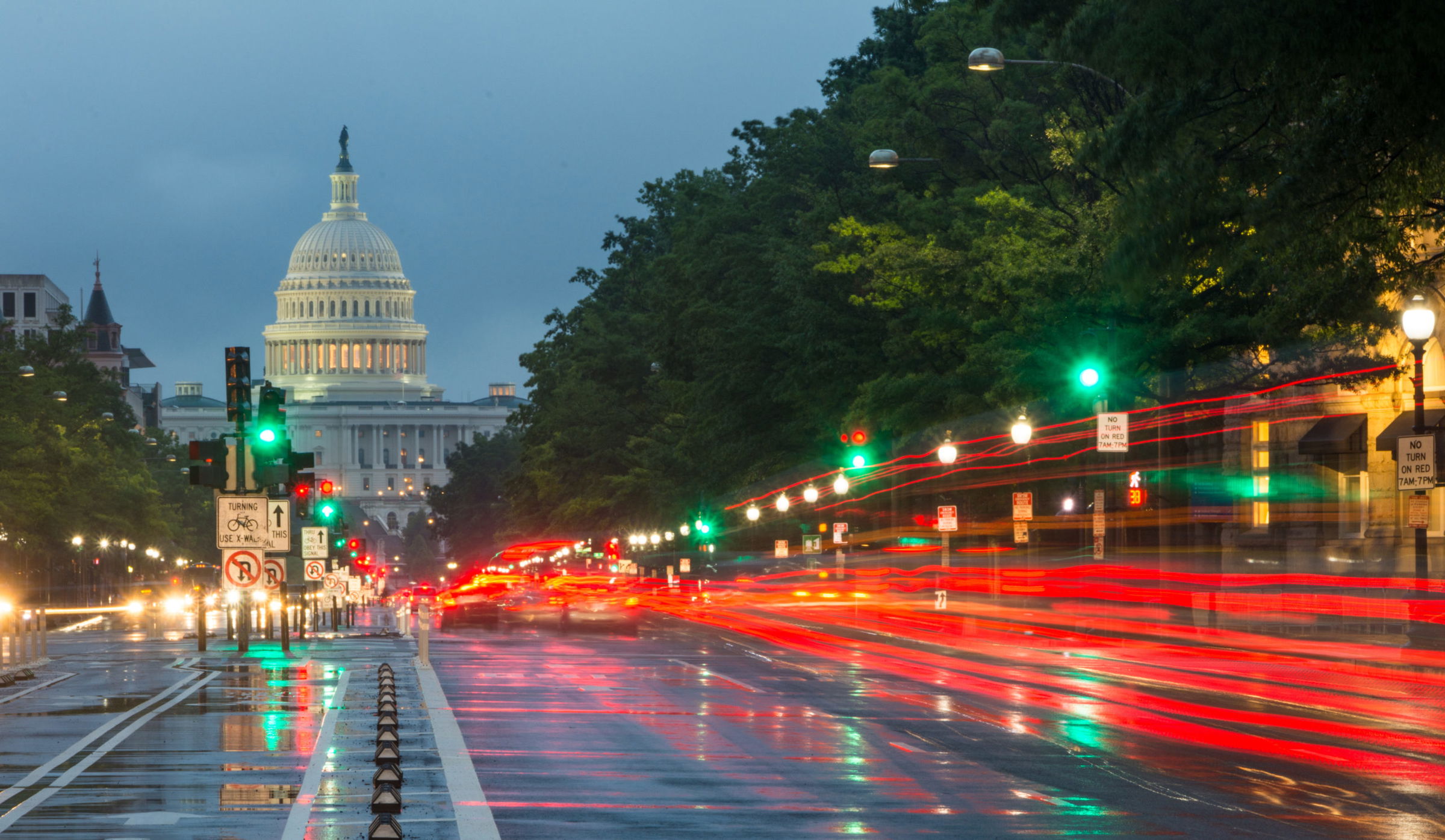 U.S. Capital at night with streaks of red traffic light. U.S. Capital